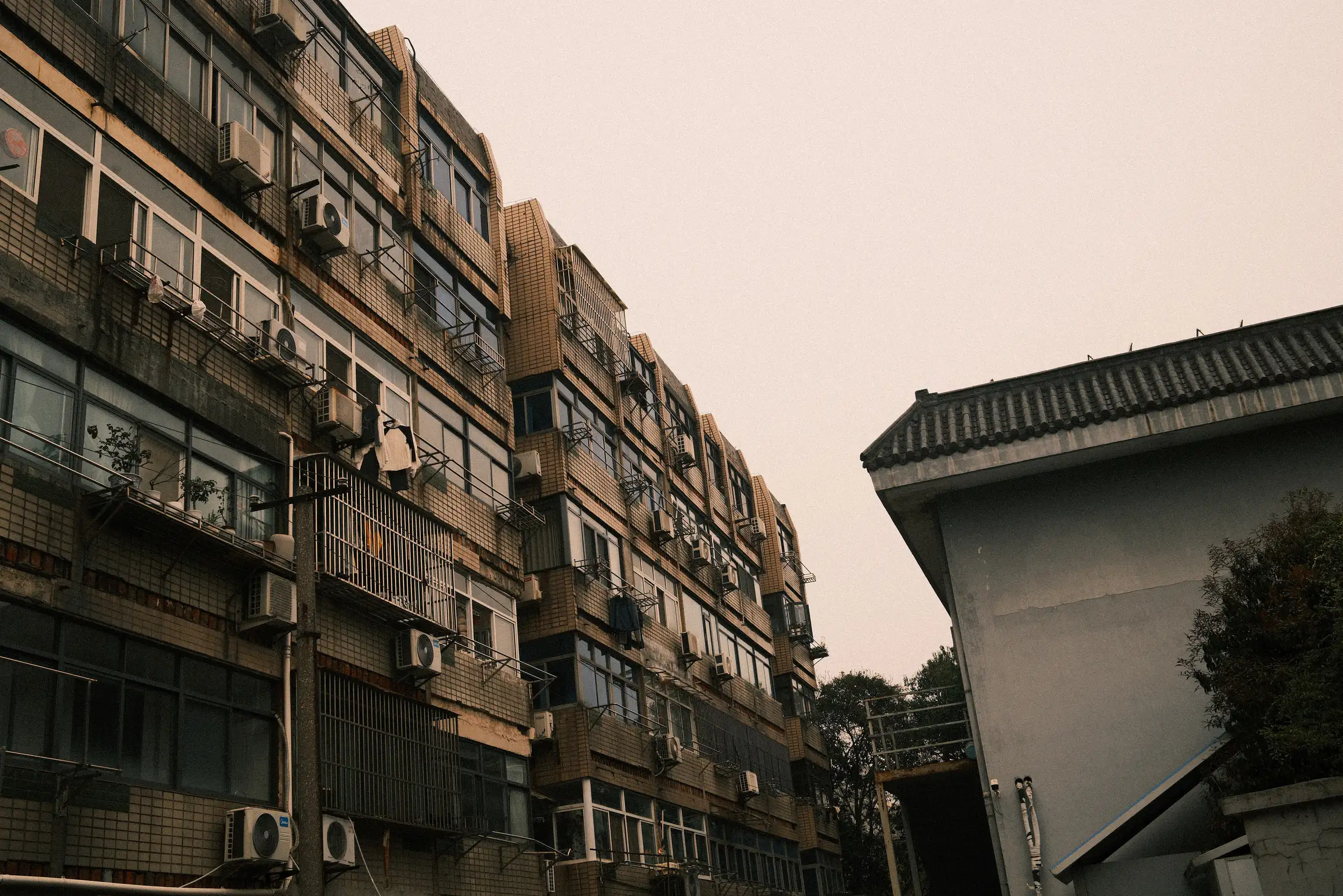 loooking up at residential buildings