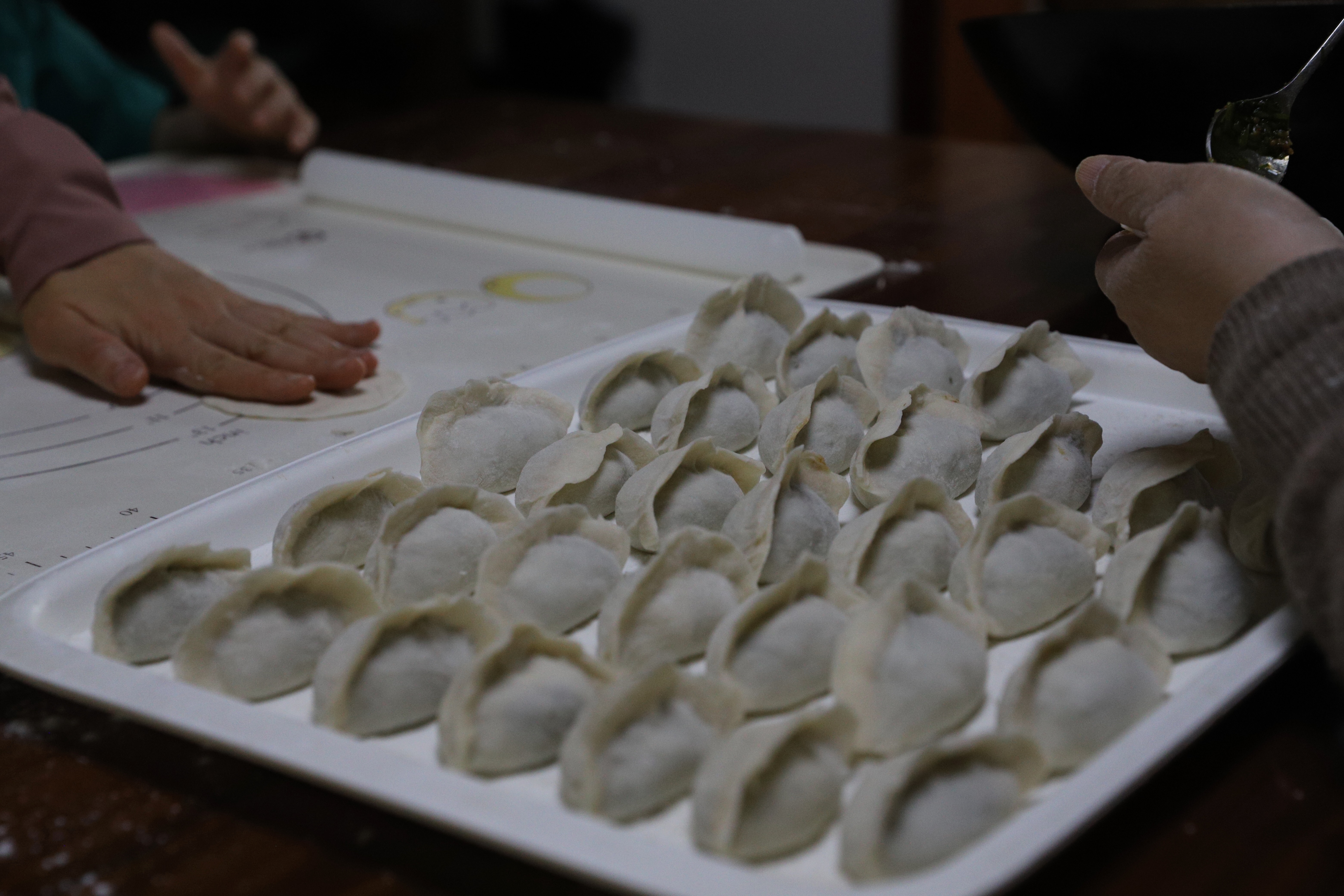 You are on the right track when they hold their shape before cooking.