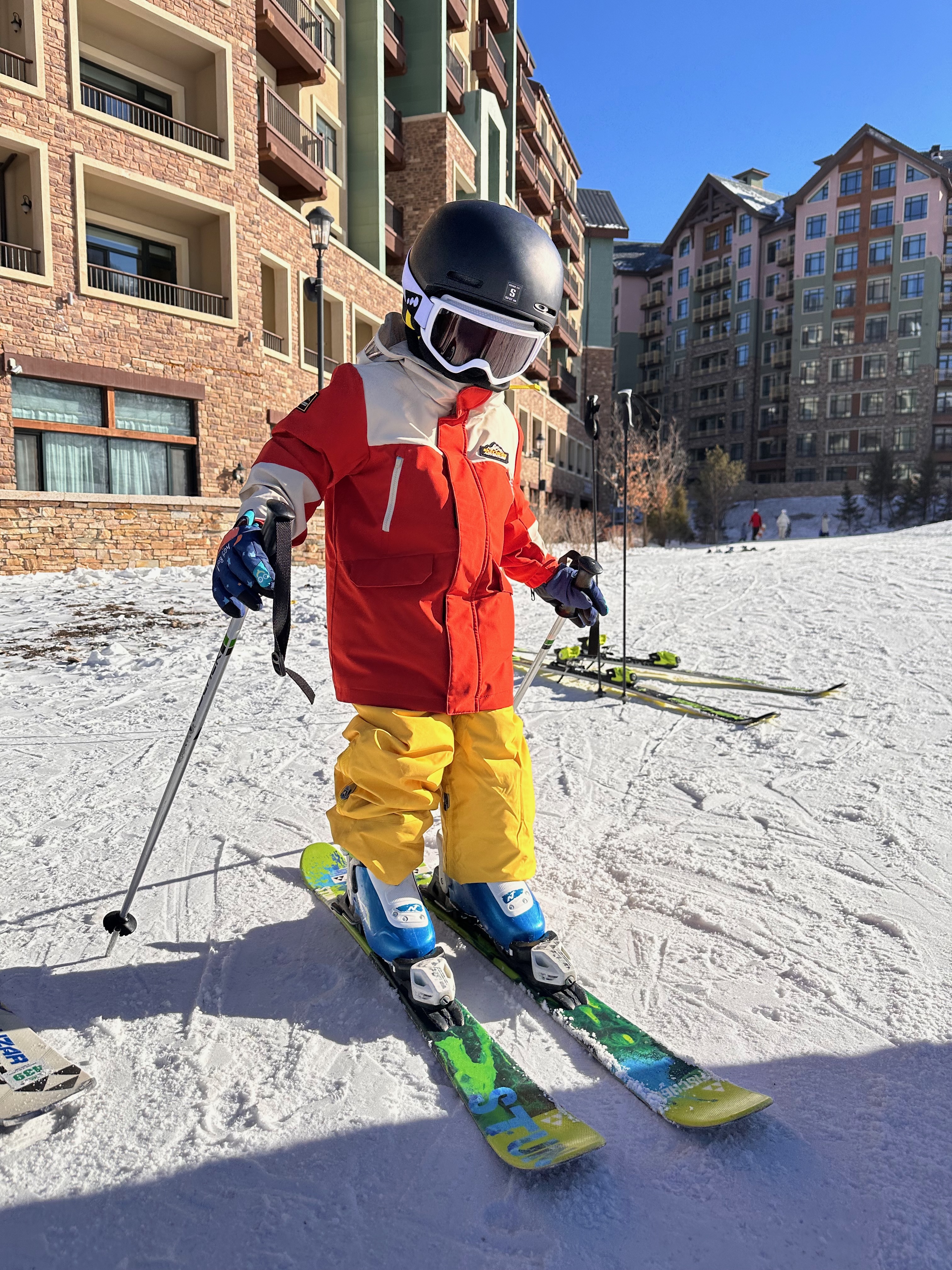 Our eldest preparing to ski down from the hotel on our first day.