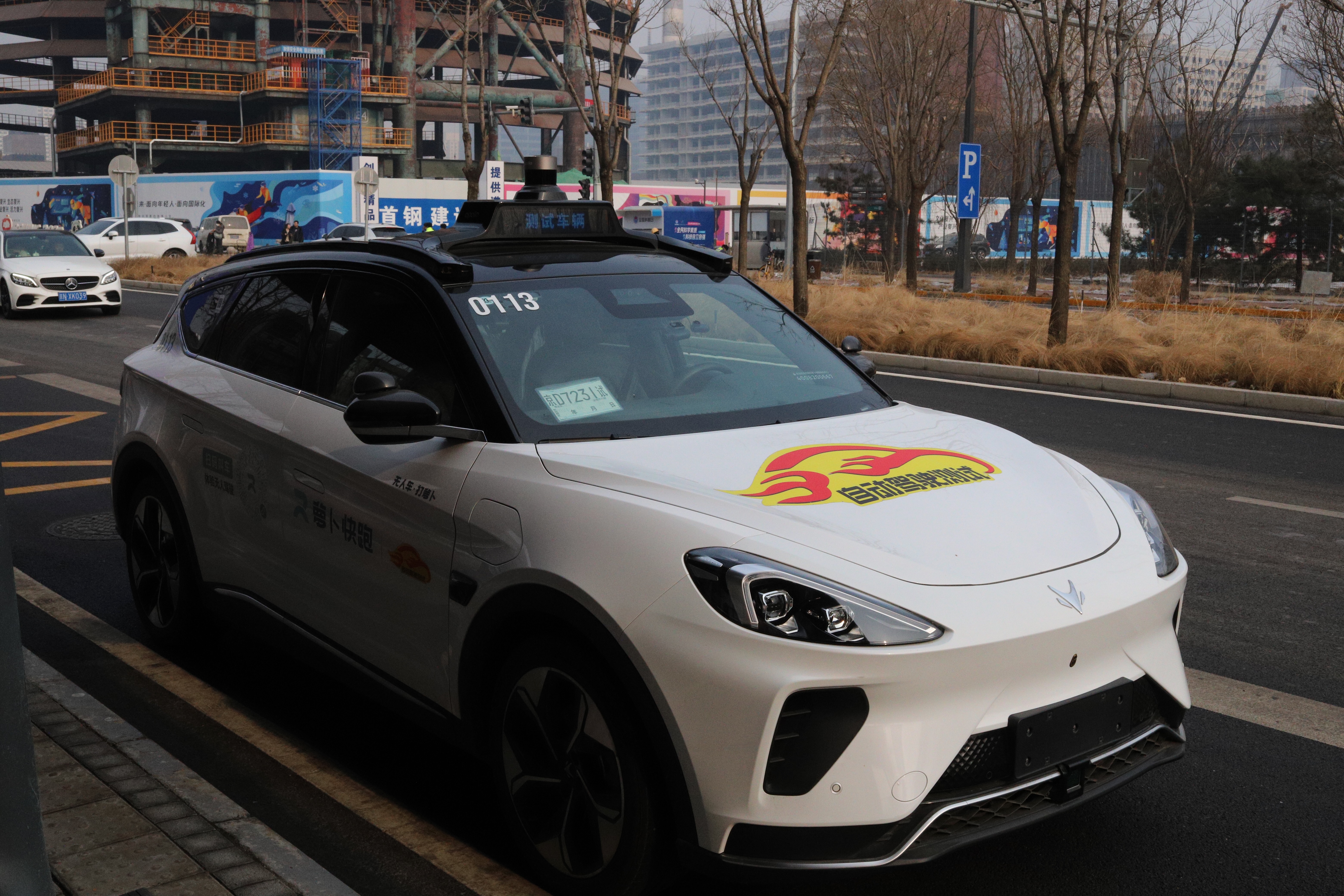 A photo of our driverless taxi. Sensor arrays are getting smaller but it felt reassuing to see the presence of a roof mounted Lidar sensor.